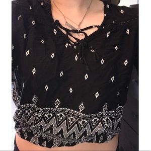 Slightly cropped 3/4 length sleeve top